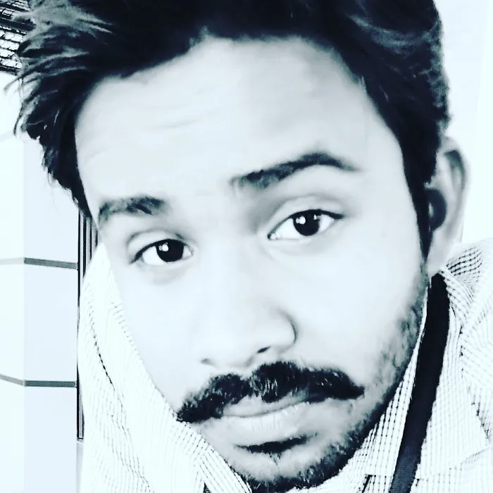 Close-up of a man with a mustache edited into a black and white photo, illustrating people photoshopping Mr. Bean.