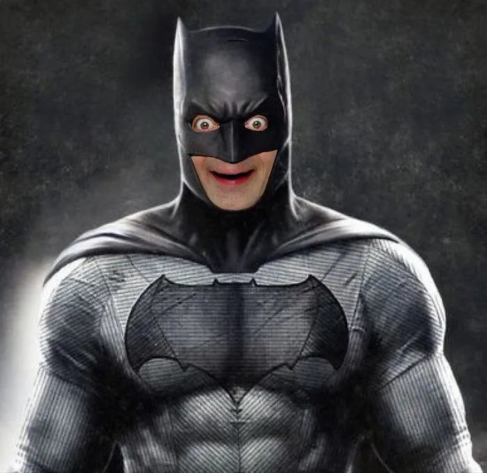 Batman suit with Mr. Bean’s face photoshopped in, creating a hilarious and unexpected superhero mashup.