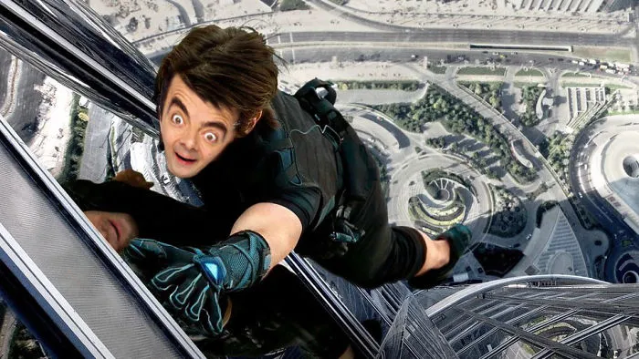 Photoshopped image of Mr Bean climbing a skyscraper, showcasing hilarious and creative digital edits.