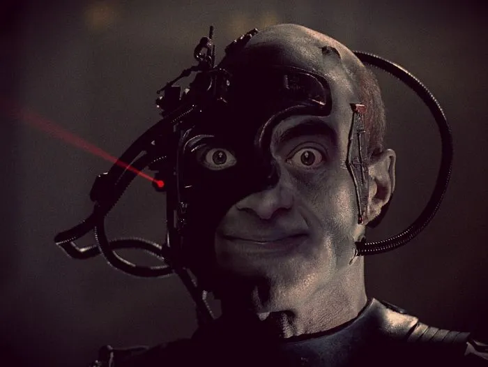 Photoshopped image of Mr. Bean combined with a cyborg character, highlighting humorous digital photo editing of Mr. Bean.