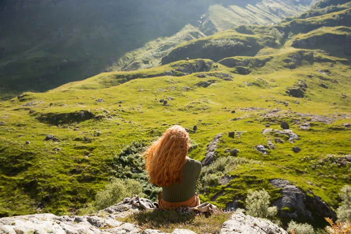 Kirstie Overlooking The Scottish Highlands Of Glencoe