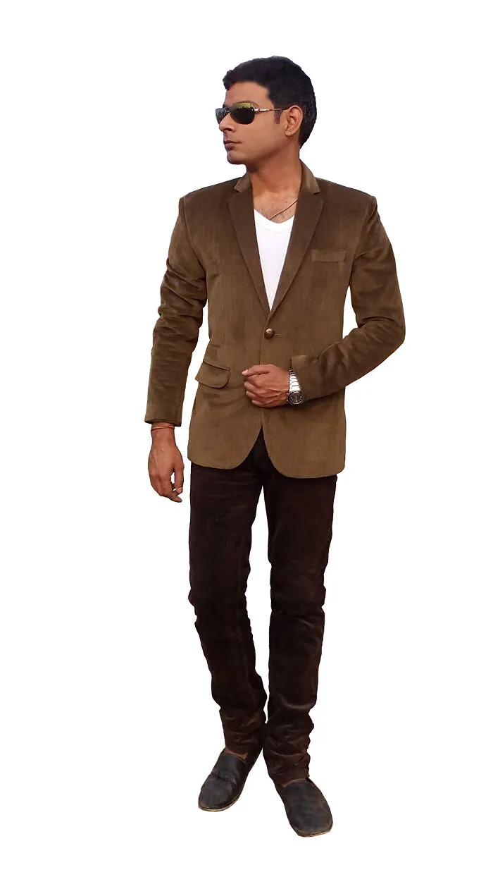 Man wearing brown blazer and sunglasses standing confidently, related to people photoshopping Mr Bean into things.