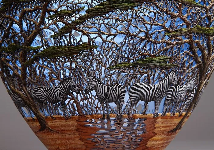 Kenya-Born Artist Hand-Carves Intricate Scenes Of Local Nature On Wood