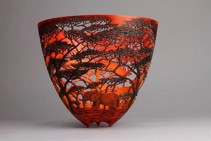 Kenya-Born Artist Hand-Carves Intricate Scenes Of Local Nature On Wood