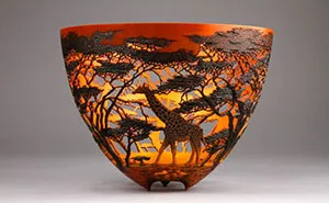 Kenya-Born Artist Hand-Carves Intricate Scenes Of Local Nature On Wood