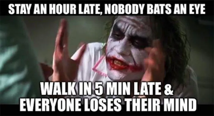 Joker meme humorously highlighting work timing frustrations.