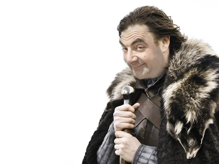 Mr. Bean photoshopped into a medieval outfit holding a staff, blending humor and historical costume.
