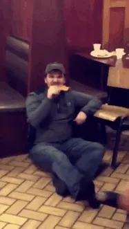 Just Enjoying His Pizza