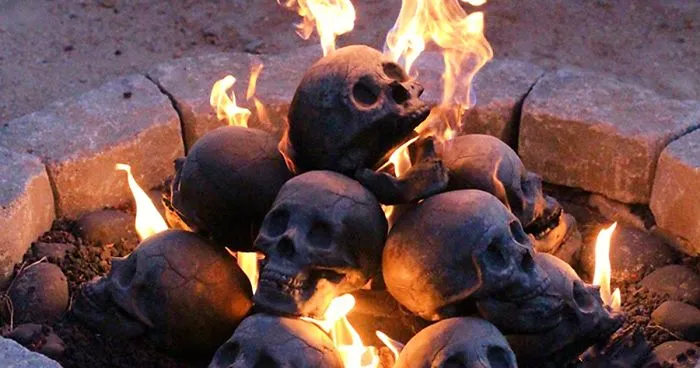 Terrifying Fireproof Human Skull Logs For Your Next Family Camping Trip