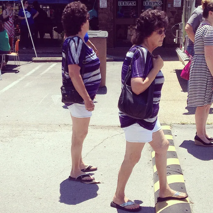 Womans wearing same clothes walking