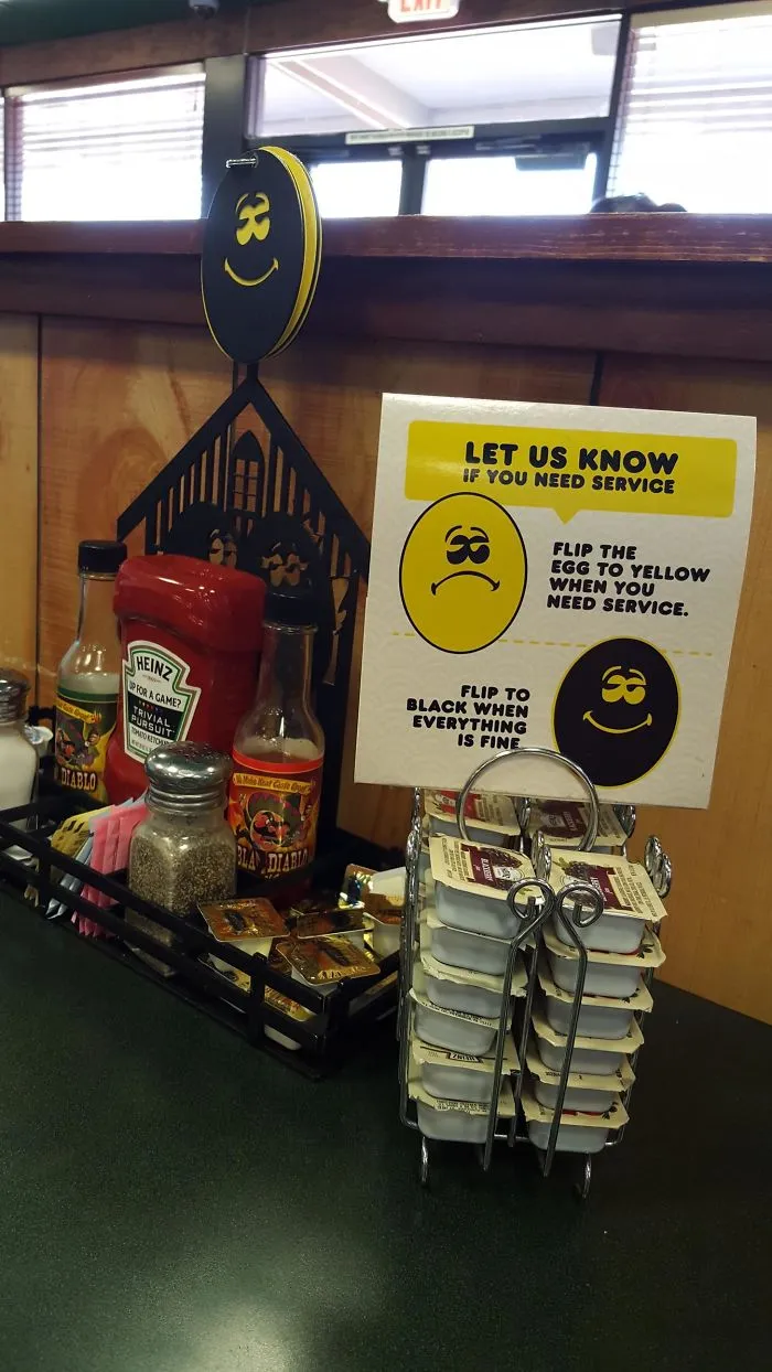 This Restaurant Has A Sign To Let The Waiter Know If You Need Help