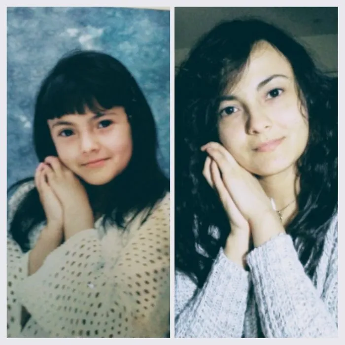 Young girl posing with hands together in recreated childhood portrait