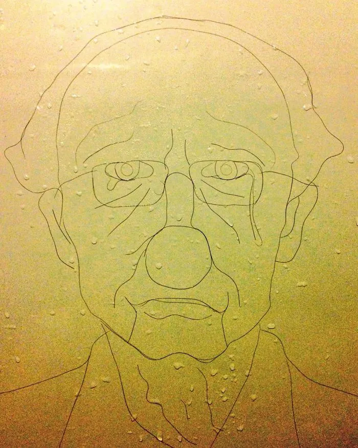 This Girl Accidentaly Created A "Drawing" Using Her Shower Hair, And Now She Can't Stop
