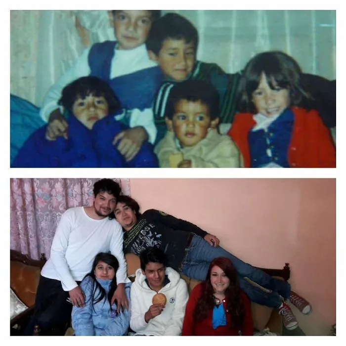 Siblings laugh while recreating childhood group photo sitting on couch indoors