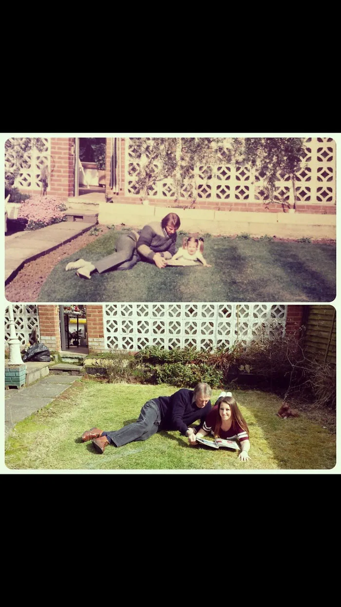 Siblings recreating childhood photo lying on the grass in backyard with book