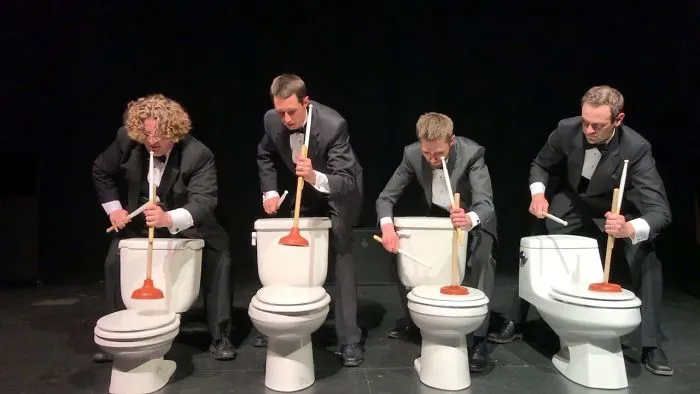 Four Guys Drum On Toilets