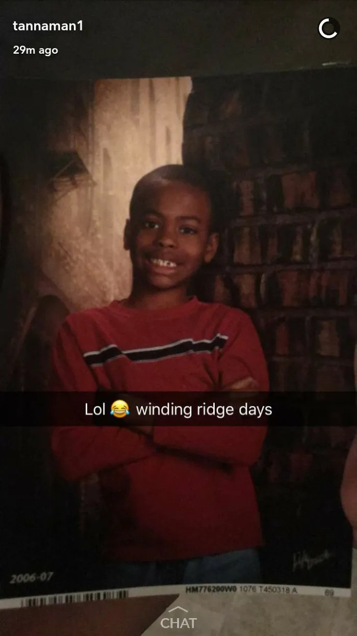 Child posing for school photo with caption referencing school days