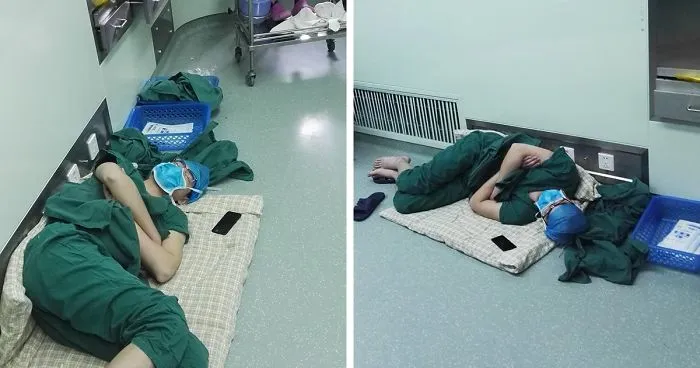 Surgeon Caught Asleep On The Floor After Epic 28-Hour Shift, And Now His Photos Are Going Viral