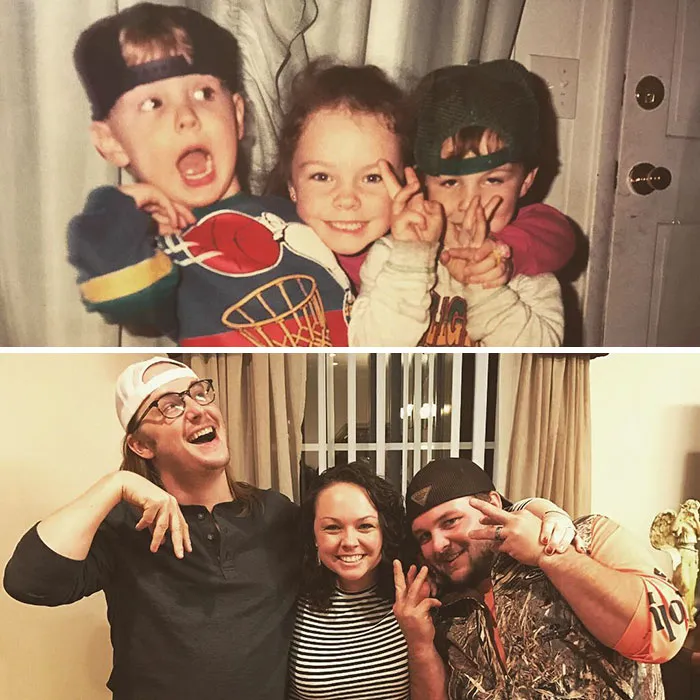 Siblings recreating childhood photo with playful expressions and hats indoors