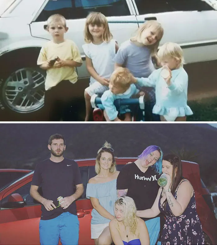 Siblings recreating childhood photo posing in front of a car making funny faces