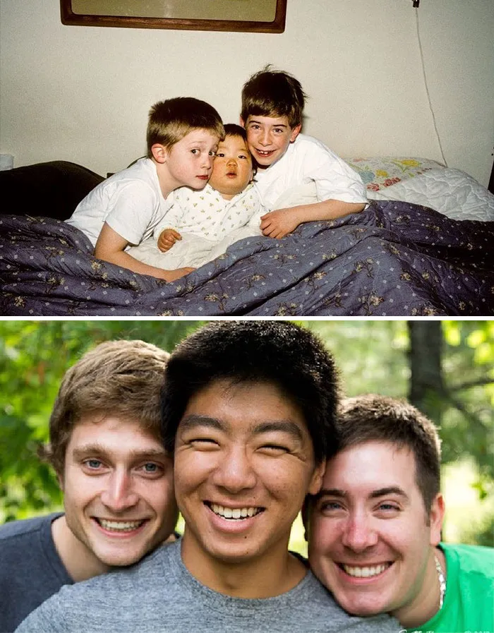 Three brothers smile in a recreated childhood photo showing sibling bond