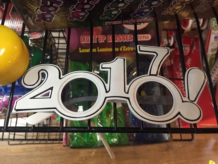 Glasses labeled "2017" in store display, showcasing one of the funniest design fails in novelty eyewear.