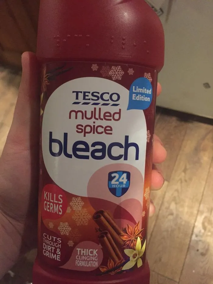"Funny design fail with a limited edition mulled spice bleach bottle held in hand."