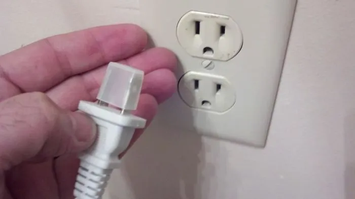 My Mom Called Me And Asked Me To Come Over And See What Was Wrong With Her New Lamp.  "It Won't Plug In," She Said, "It's Like It Needs A Different Style Plug Or Something"