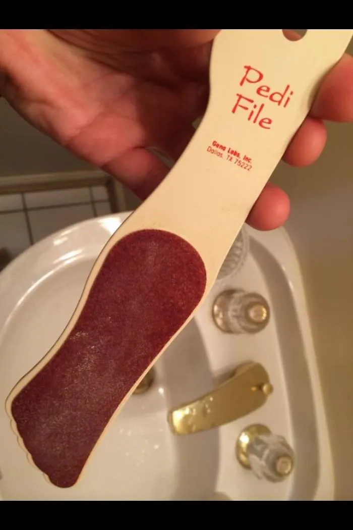 A humorous design fail: a foot file labeled as "Pedi File," creating an unintended pun.