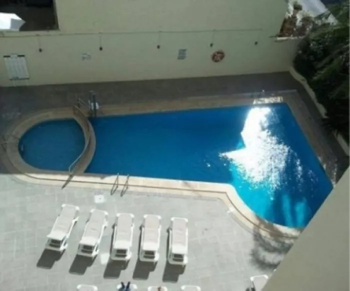 Swimming pool with an awkward shape, illustrating a humorous design fail.