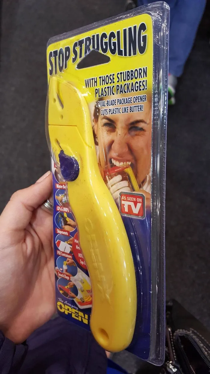 This Blade, Designed To Open Those Annoying Stubborn Plastic Packages, Is Packed Inside One Of Said Packages