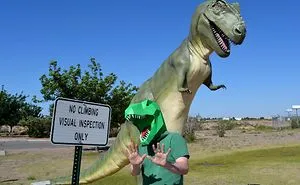 T-Rex Deals With Modern World In Paper Dinosaur Mask