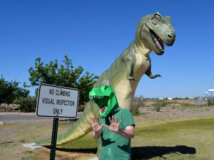 T-Rex Deals With Modern World In Paper Dinosaur Mask