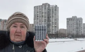 Portraits Of Tenants Holding Replicas Of Their Concrete Homes Awaiting Demolition