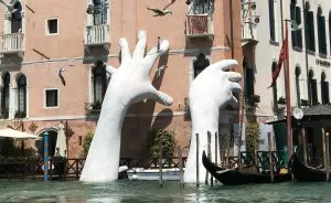 Support: Giant Hands Rise From A Canal In Venice To Send A Powerful Message About Climate Change
