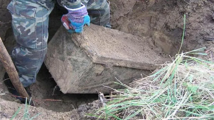 Archaeologists Unearth A Decades-Old Lock Box With Some Truly Disturbing Contents
