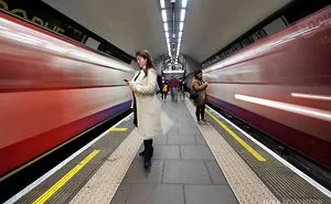 London Photographer Captures Awesome Shots Of People Waiting For Trains
