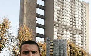 Portraits Of Tenants Holding Replicas Of Their Concrete Homes Awaiting Demolition