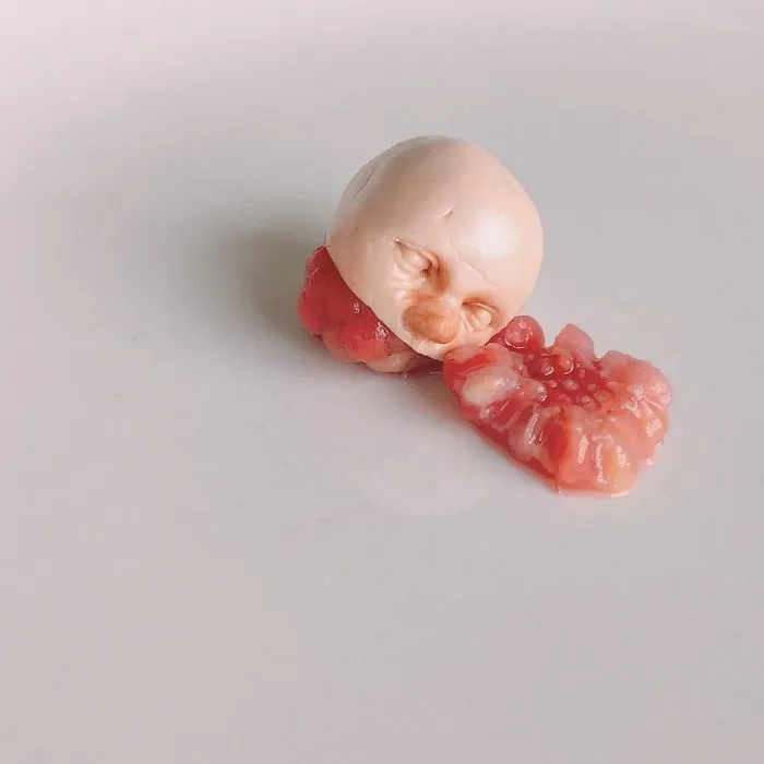 Unsettling Baby Carving Sculptures By Qixuan Lim