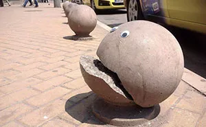 Someone In Bulgaria Is Putting Googly Eyes On Broken Street Objects, And It's Even Better Than Fixing Things