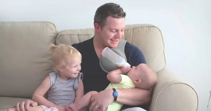This Hands-Free Bottle Holder Will Make Every Parent's Life Easier