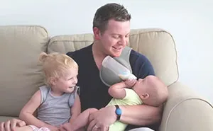 This Hands-Free Bottle Holder Will Make Every Parent's Life Easier