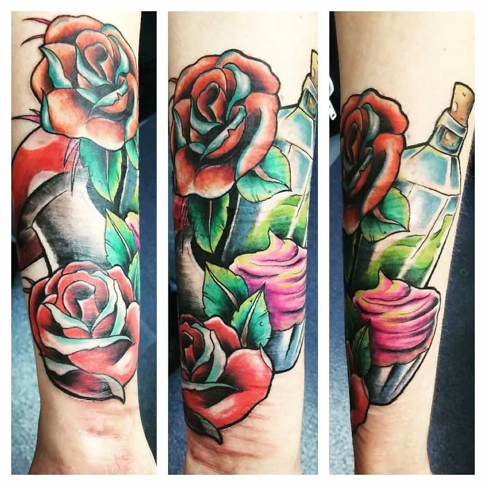 Colorful rose tattoo turning scars into art on forearm, showcasing vibrant floral design and creativity.