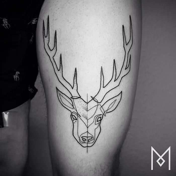 Single line tattoo of a stag head by artist Mo Ganji, showcasing intricate geometric design on a person's thigh.