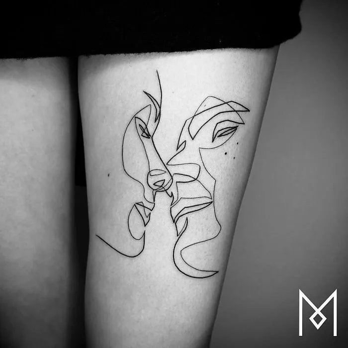 Continuous line tattoo of two faces by Mo Ganji on forearm.