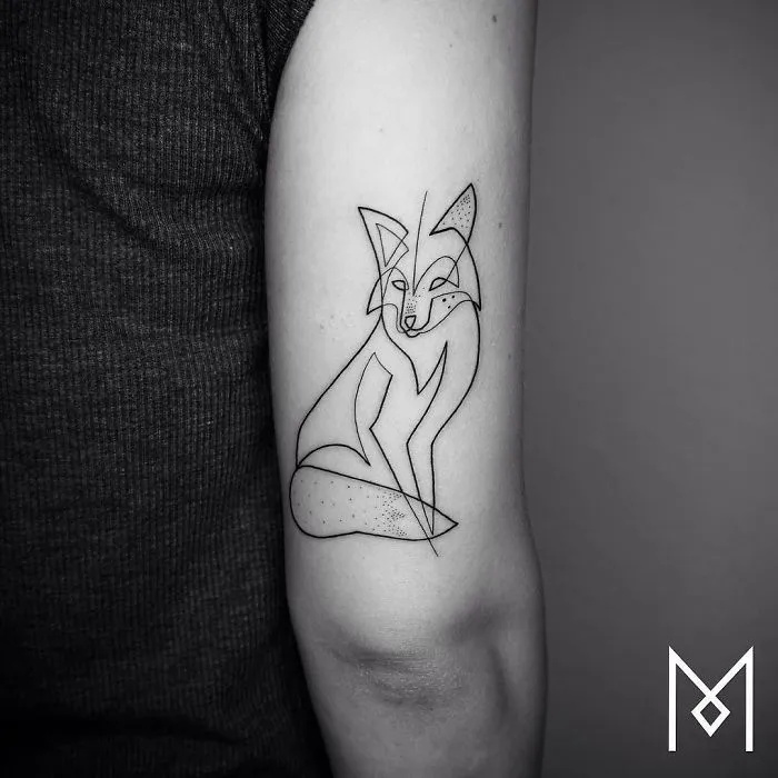 Single continuous line tattoo of a fox on an arm by Mo Ganji.
