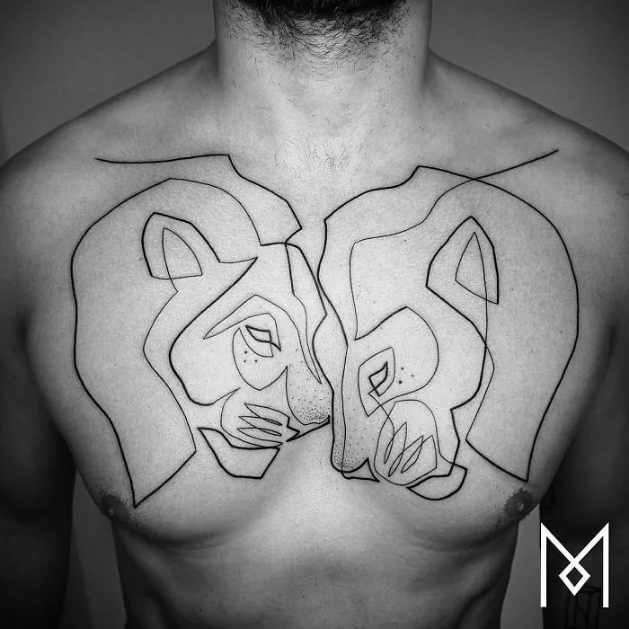 Chest tattoo of two lions facing each other, created using a single continuous line by Mo Ganji.