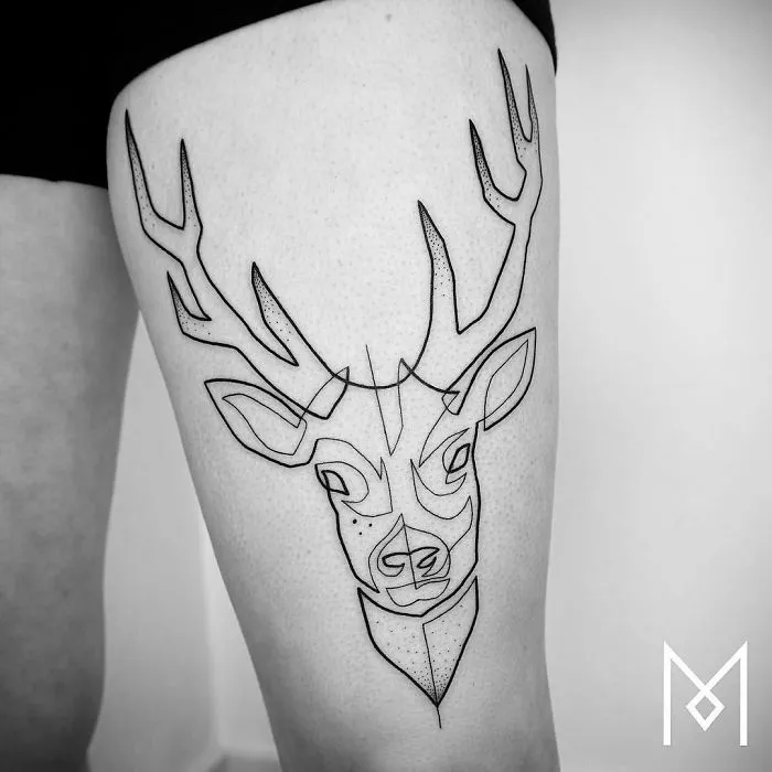 Single continuous line tattoo of a deer on a person's leg by Mo Ganji.