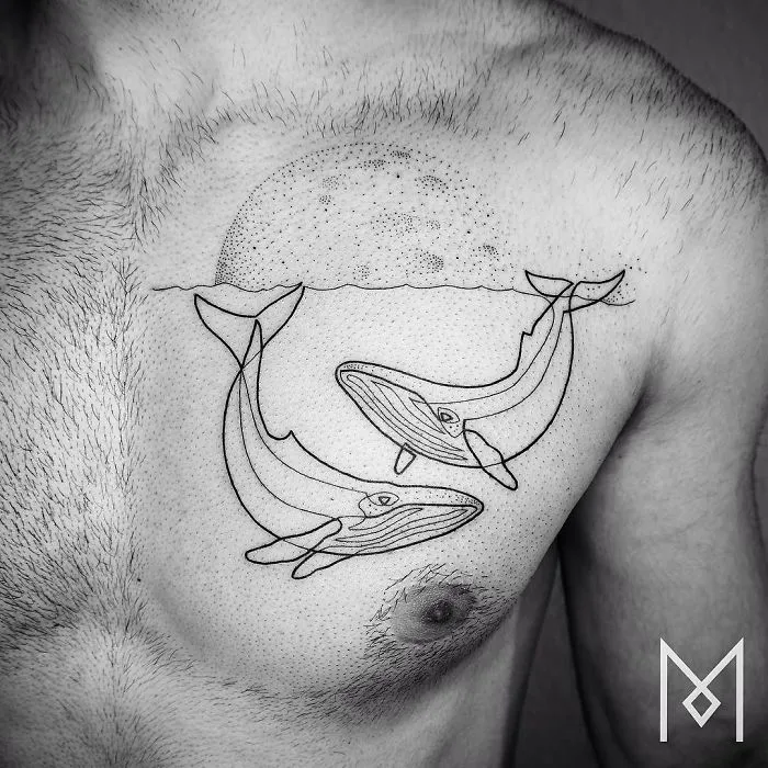 Single continuous line whale tattoo on chest by Mo Ganji.