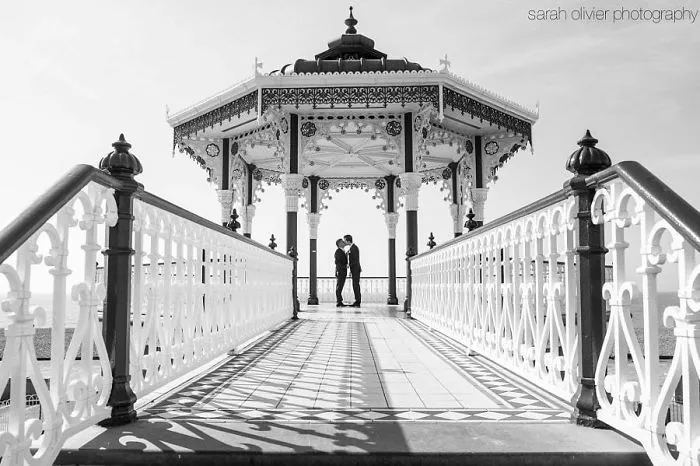 Two men kissing 